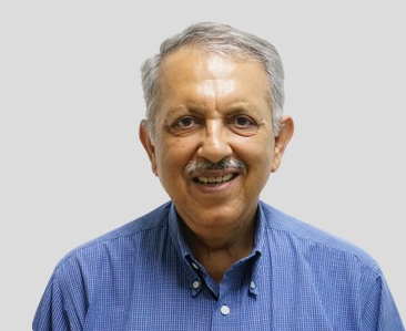 Dr. Arvind Taneja